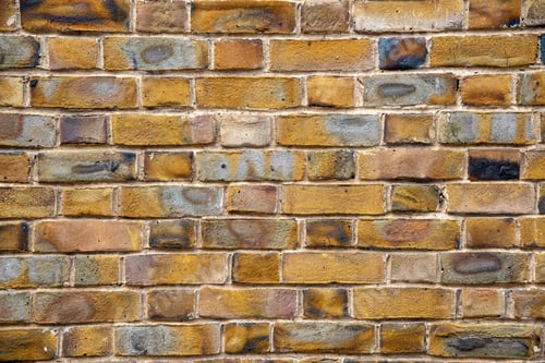 Visualização: Fundo de parede arquitetônico com tijolos marrons. Detalhes texturizados abstratos