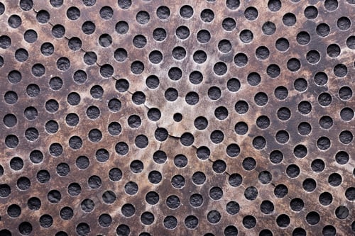 Preview: perforated metal bottom with small circular holes, top view