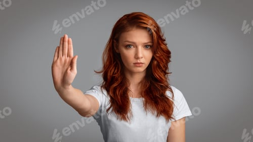 Preview: Teen Girl Gesturing Stop Forbidding Something Standing On Gray Background
