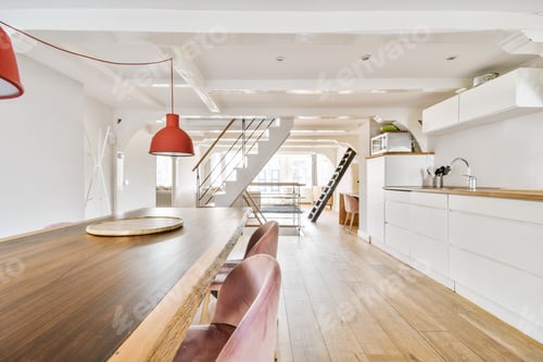 Preview: Empty dining room near kitchen