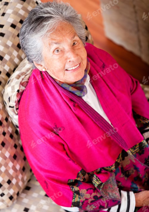 Preview: Portrait Of A Sweet Elder Woman Smiling At Home
