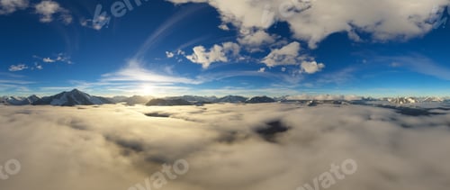 Preview: Dramatic Aerial Panorama of Clouds and Mountain Landscape. Nature Background.