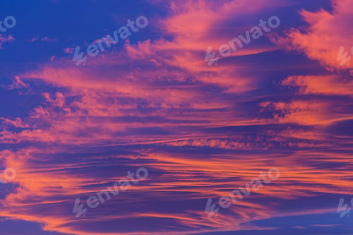 Dramatic Pink and Blue Streaked Cloudscape at Sunrise