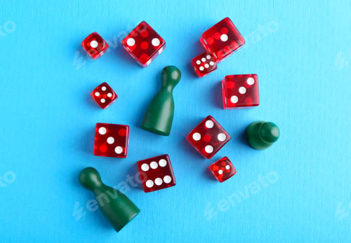 Preview: Many red dices and color game pieces on light blue background, flat lay