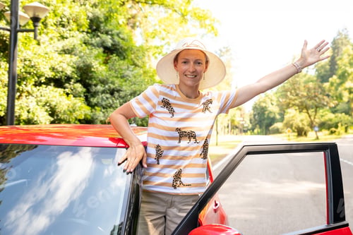 Preview: enjoying purchase in dealership, rent a car, travel concept.positive cheerful girl funky driver