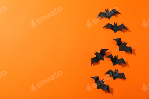 Preview: Decorative bats on orange background, space for text