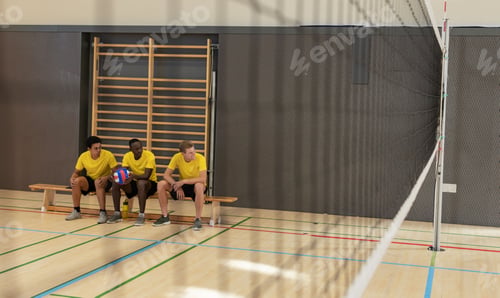 Preview: Diverse male volleyball partners sitting on bench at school gym holding ball near net, copy space