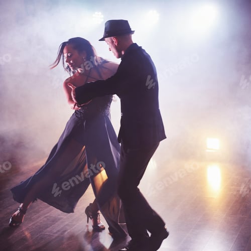 Preview: Skillful dancers performing in the dark room under the concert light and smoke