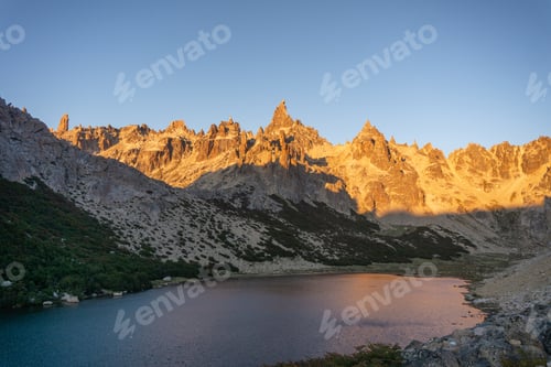 Preview: View of the mountains and lake at sunrise