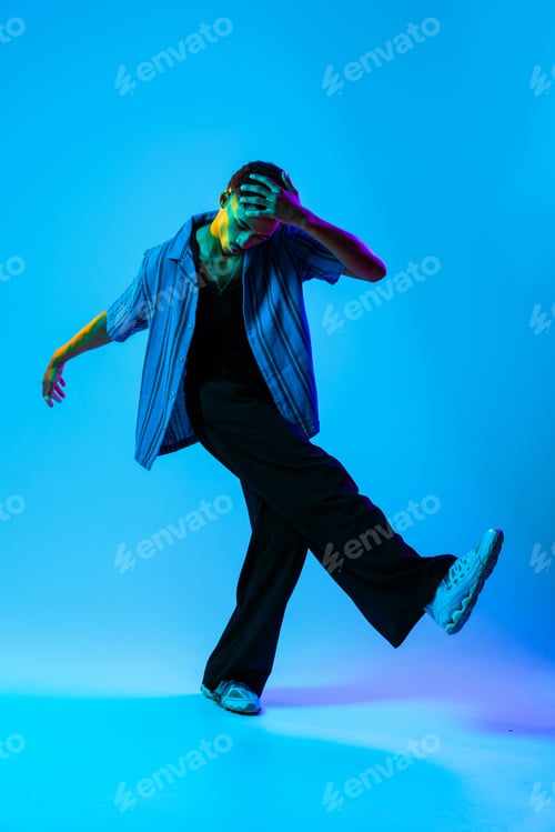 Preview: African man portrait in studio on colorful background