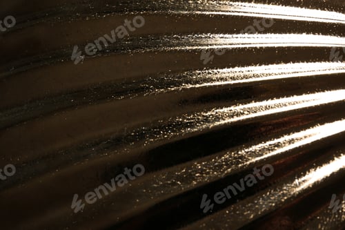 Preview: Corrugated golden texture as background, closeup view