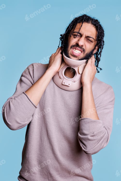 Preview: Arab man with neck injury wearing cervical collar