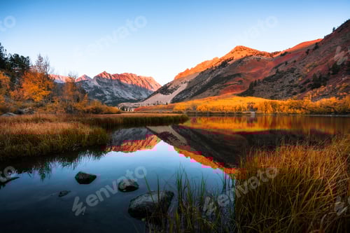 Preview: Beautiful shot of a lake with hills in the background