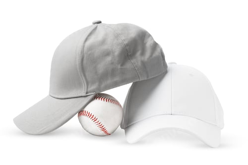 Preview: Two White Baseball Caps on a White Background