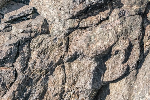 Preview: texture of old stone rock surface.Brown stone or rock background and texture.horizontal black stone