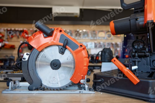 Preview: Closeup of circular hand saw on the table in tool workshop store