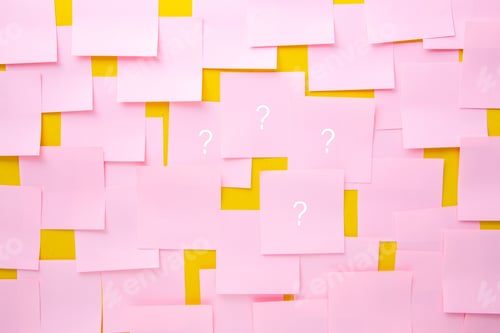 Preview: Pink sticky notes with question marks. Uncertainty or doubt concept.