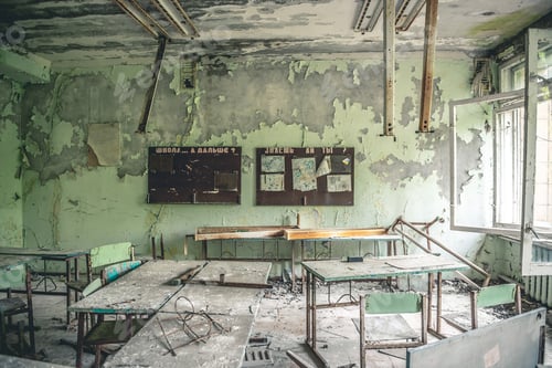 Preview: ruined class room with desks and blackboards in Pripyat school