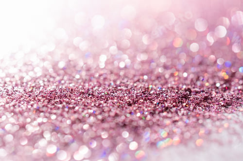 Preview: Abstract sequin background with shining festive bokeh.