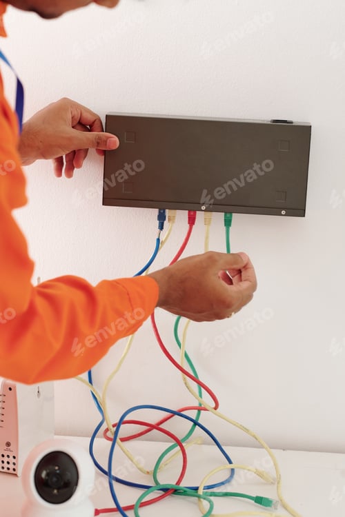 Preview: Technician Installing Video Surveillance Equipment
