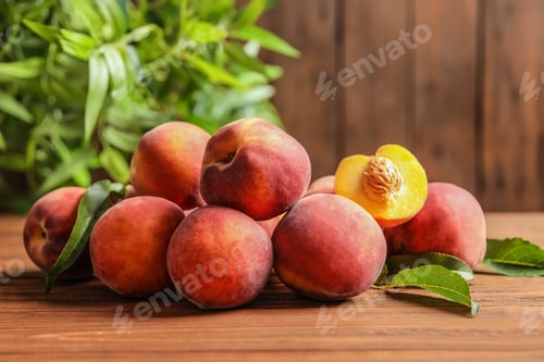 Preview: Fresh sweet ripe peaches on wooden table