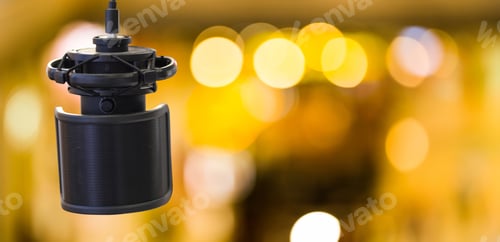 Preview: Professional condenser microphone for record voice on golden bokeh background. Professional mic