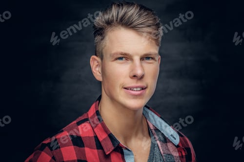 Preview: Portrait of positive stylish male in a red shirt.