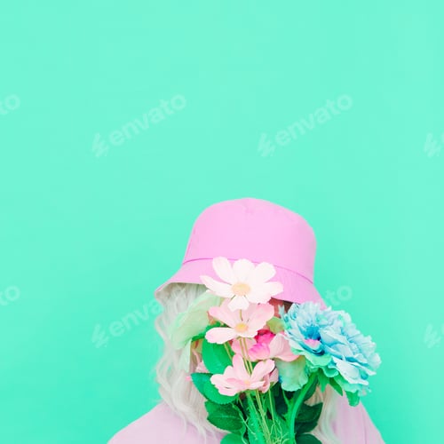 Preview: Sensual summer girl with flowers in trendy bucket hat. Fresh pastel colours vibes.