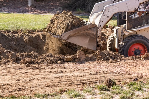 Preview: Small Bulldozer Digging In Yard For Pool Installation
