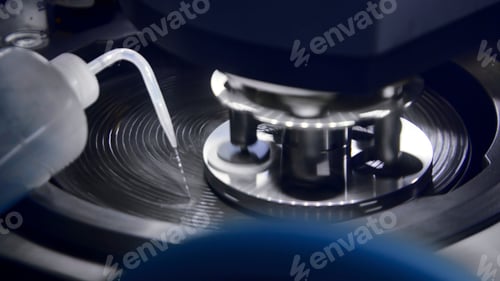 Preview: Mechanical processing of laboratory equipment. Stock footage. Liquid is poured onto laboratory