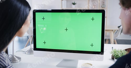 Preview: Business, people and computer with green screen in office for finance planning, tracking markers an