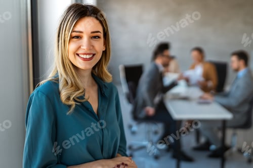 Preview: Portrait of successful multicultural business team working in corporate business office