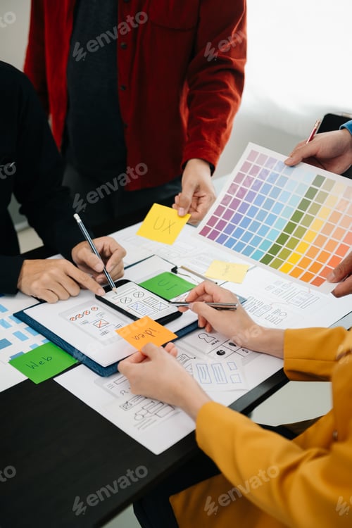 Preview: UX developer and ui designer brainstorming about mobile app interface wireframe design