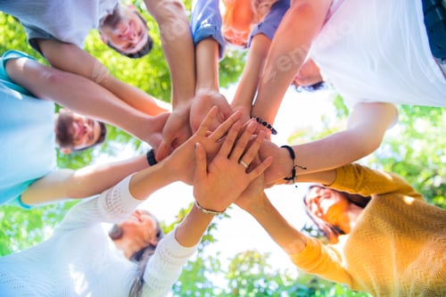 Preview: Group Of A Friends Hands Together