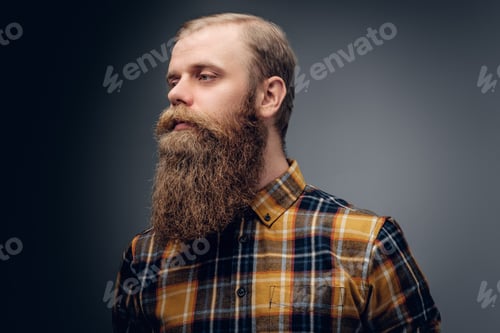 Preview: Redhead male dressed in a yellow hipster shirt.