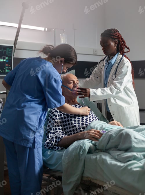 Preview: African doctor helping senior patient breath using repiratory ventilation tube