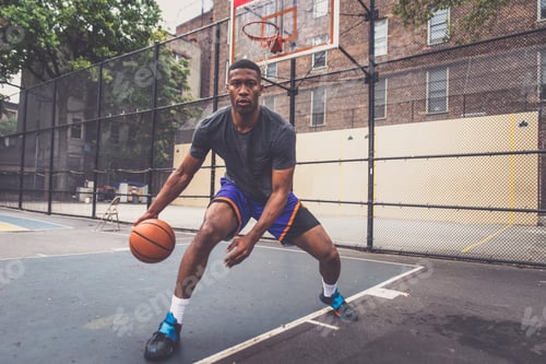Preview: Basketball player training on a court in New york city