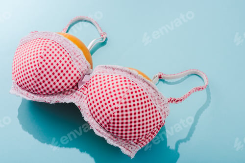 Preview: bra with two oranges on blue, breasts concept