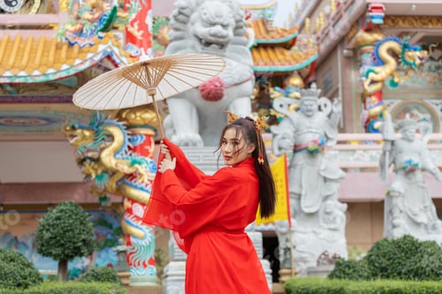 Preview: Asian girl wearing Chinese costumes decoration for Chinese new year