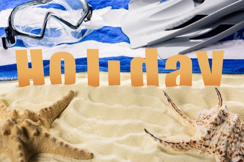 Preview: Mask and Holiday inscription on sandy beach with seashell and strafish