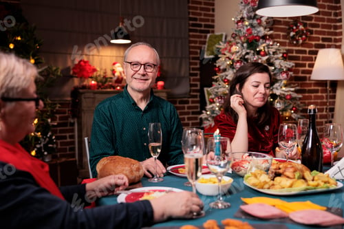 Preview: Woman celebrating christmas with family