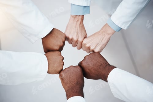 Preview: Doctors fist bump in teamwork motivation and solidarity hands sign for commitment, motivation or go