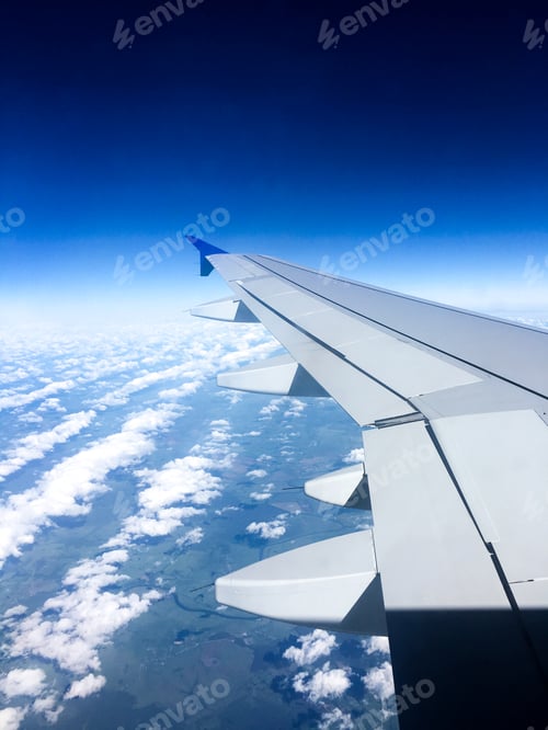 Preview: Airplane wing in the sky