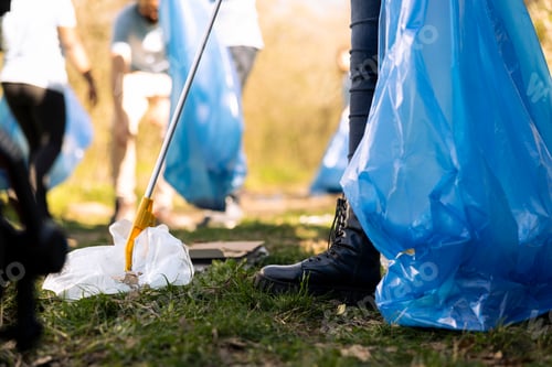 Preview: Activists collecting garbage to fix pollution issues within natural ecosystem