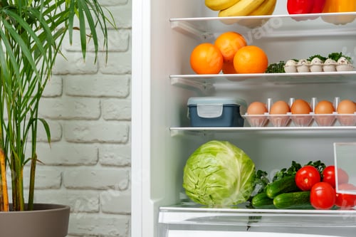 Preview: Well-Stocked Refrigerator With Fresh Produce, Eggs, and Other Groceries