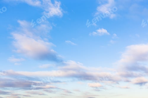 Preview: low clouds in blue sky in evening twilight
