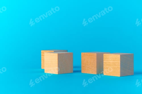 Preview: Toy wooden blocks on blue background front view