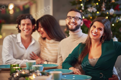 Preview: Group of friends celebrating Christmas at home