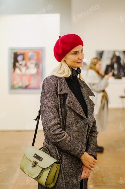 Preview: Portrait of young woman. Exhibition. Autumn season