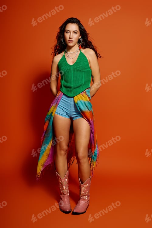 Preview: Young beautiful woman embraces summer vibes in colorful attire against vibrant backdrop